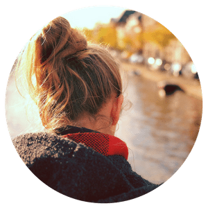 Girl by a river